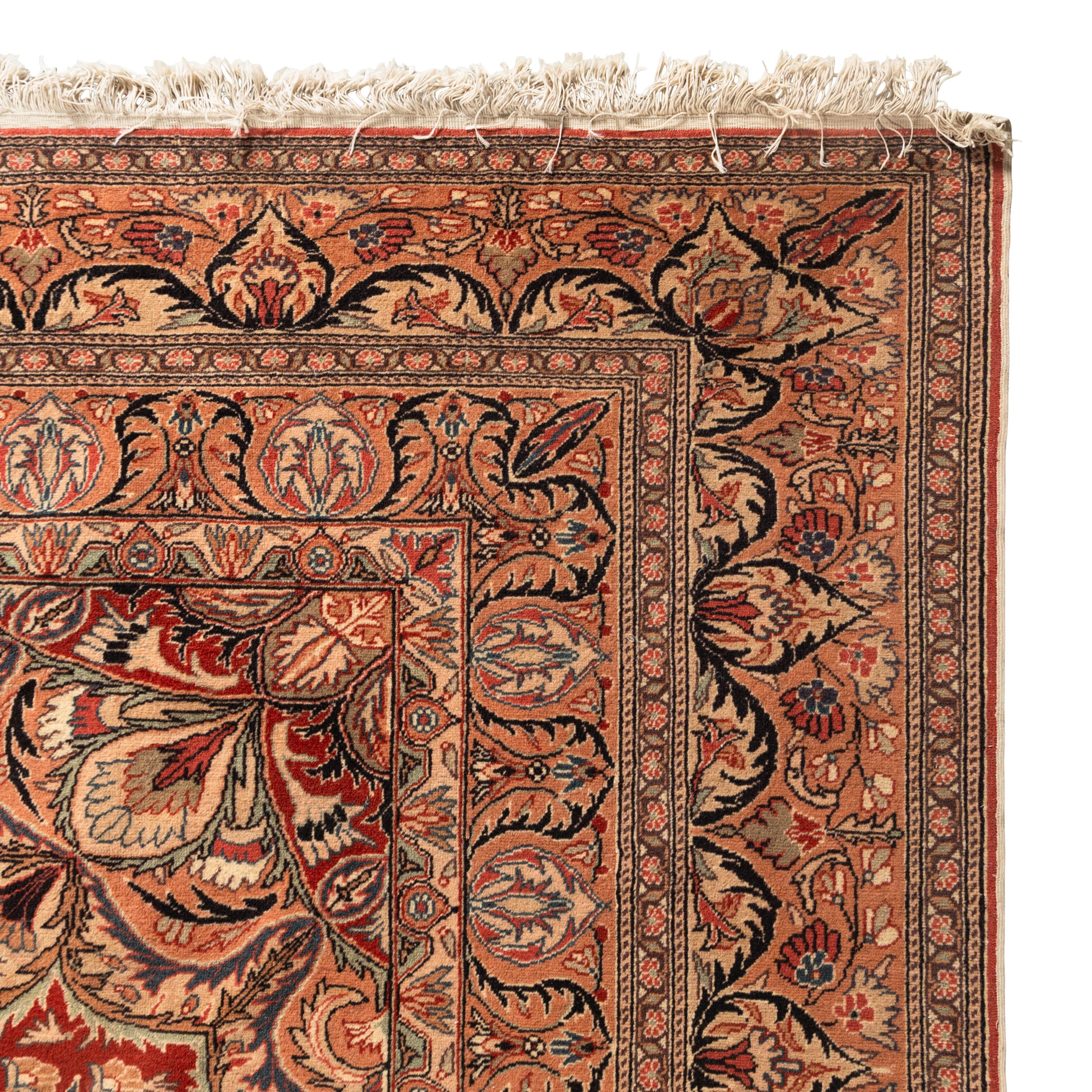 An Indian or Qom Rug