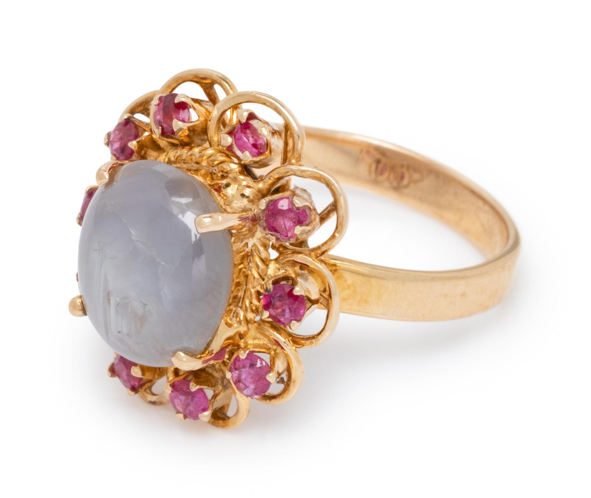 An 18 Karat Yellow Gold, Star Sapphire and Ruby Ring,