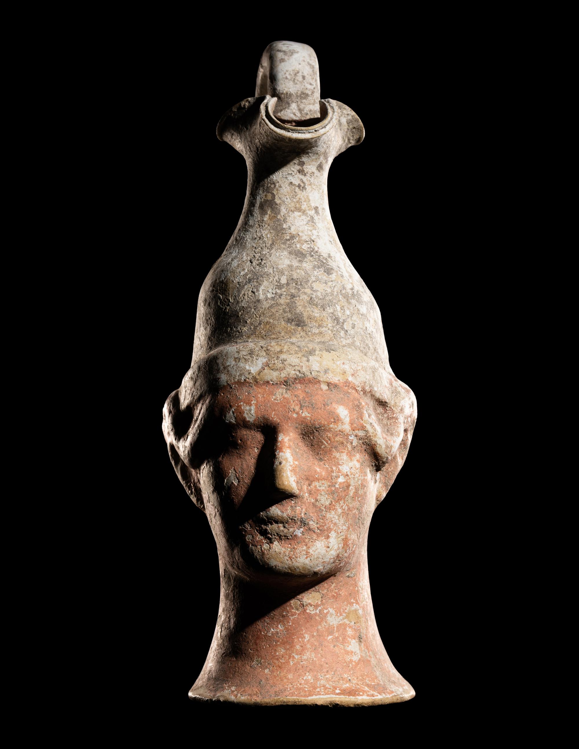 A Canosan Trefoil Oinochoe in the Form of a Head of a Man