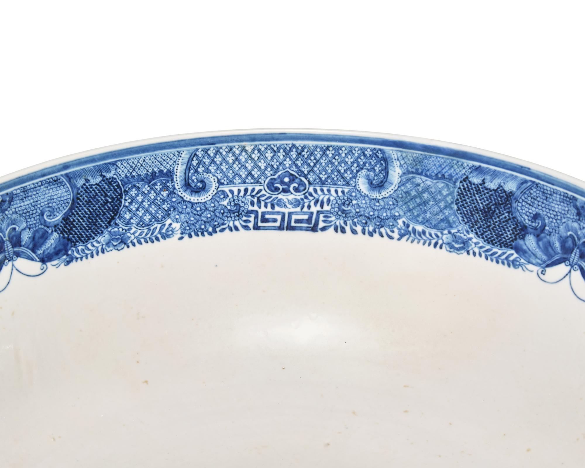 A Large Chinese Export Porcelain Blue Fitzhugh Armorial Punch Bowl Bearing the Roberts Crest
