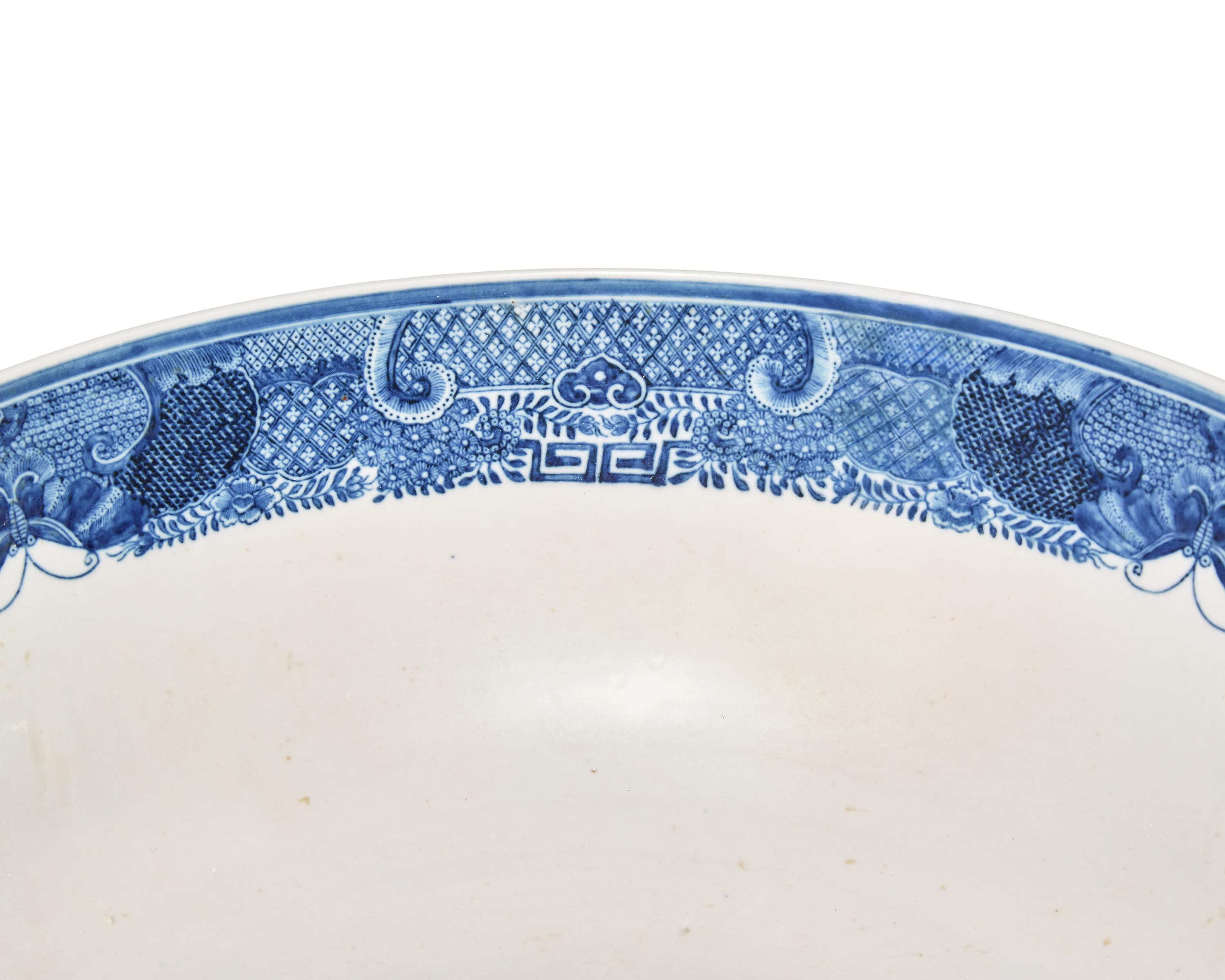 A Large Chinese Export Porcelain Blue Fitzhugh Armorial Punch Bowl Bearing the Roberts Crest