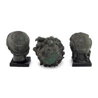 A Group of Three Greek Style Bronze Heads