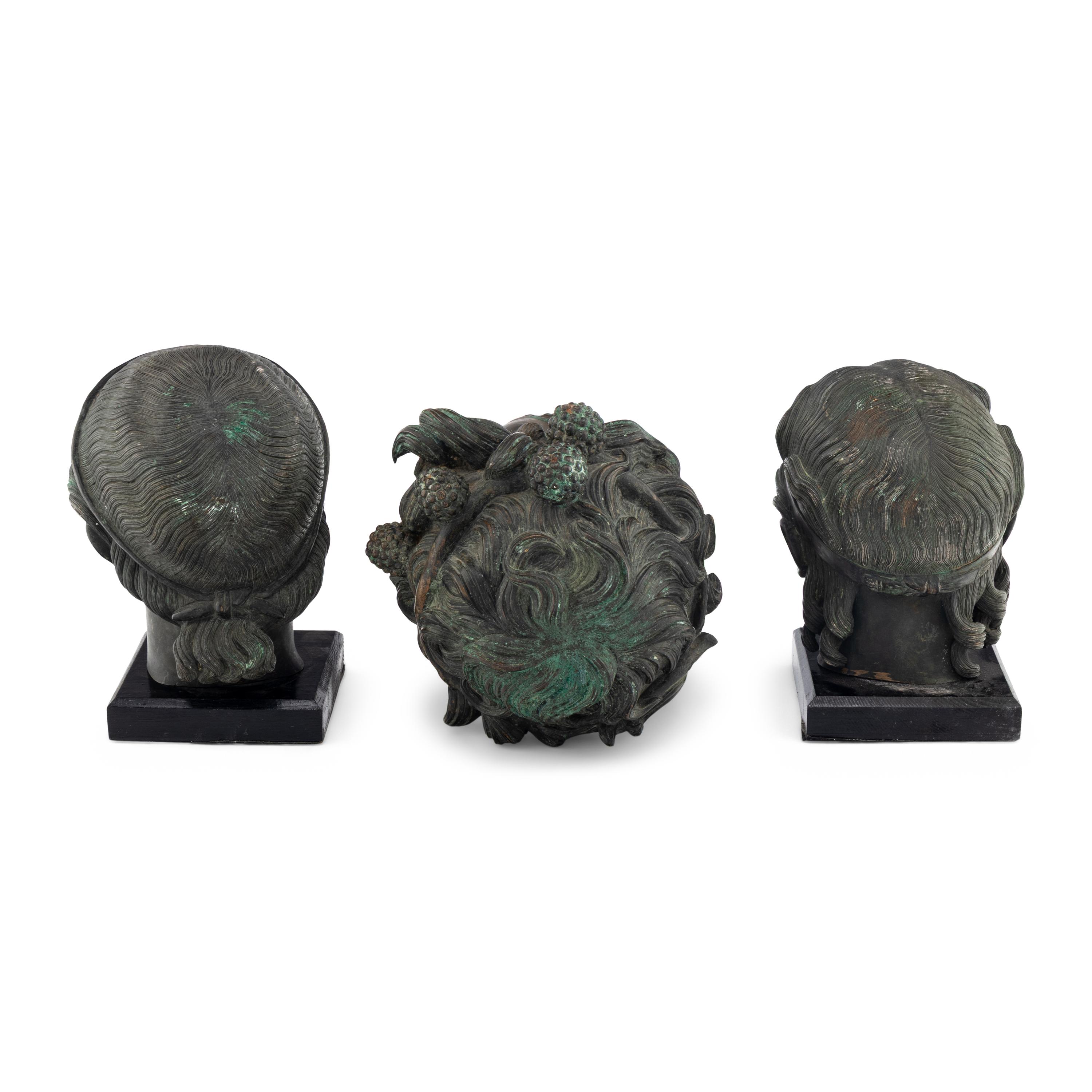 A Group of Three Greek Style Bronze Heads