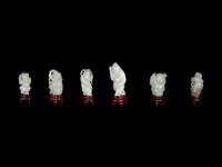Six Chinese Carved Celadon Jade Figures of Boys