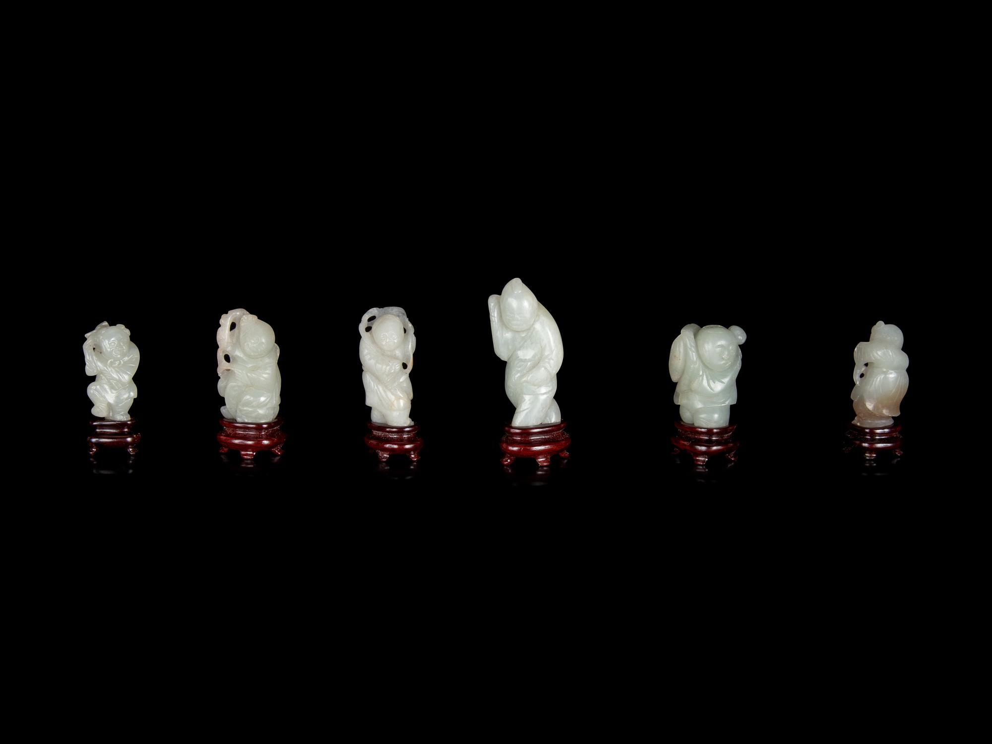 Six Chinese Carved Celadon Jade Figures of Boys