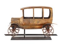 A Gilt, Cut, and Pressed Sheet Metal Automobile Weathervane