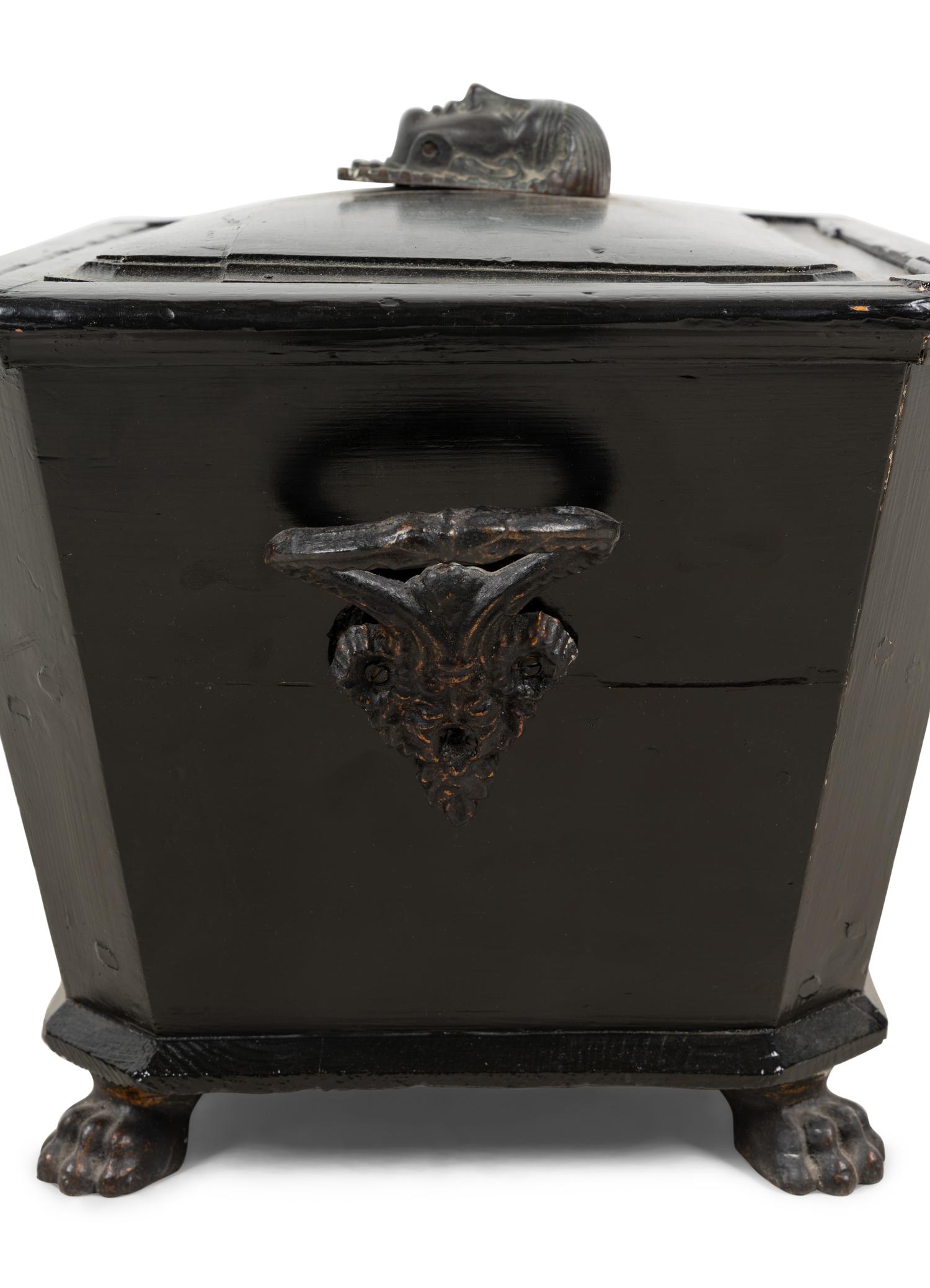 An Egyptian Revival Ebonized Coal Hod