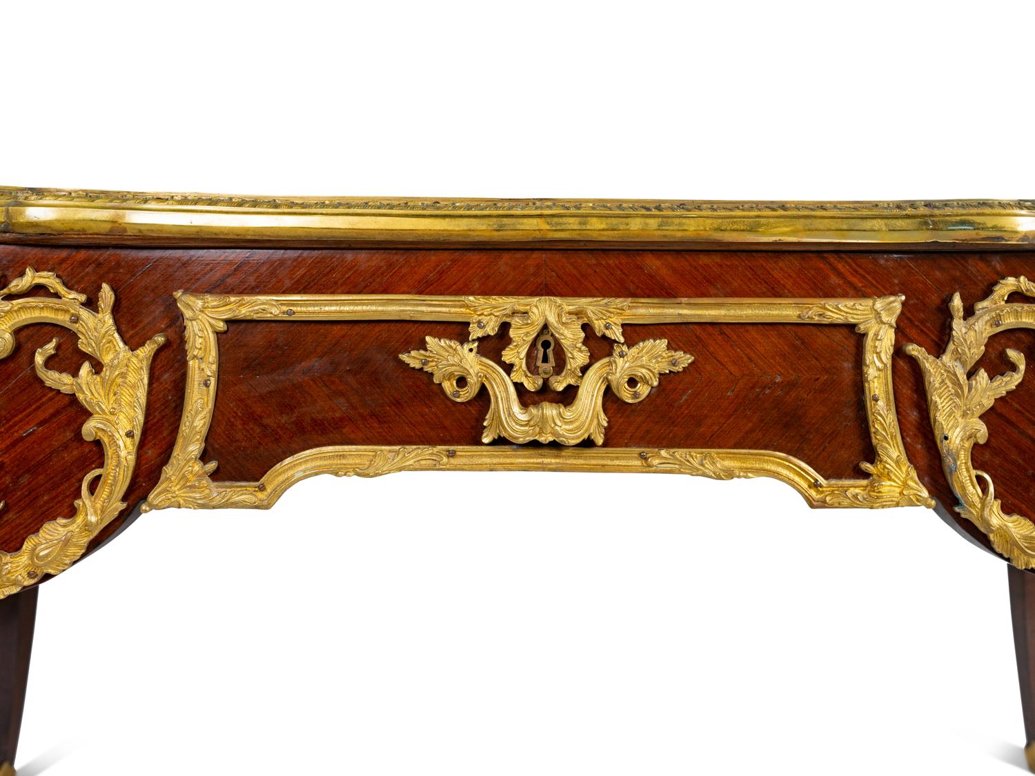 A Louis XV Style Gilt Bronze Mounted Kingwood Bureau Plat