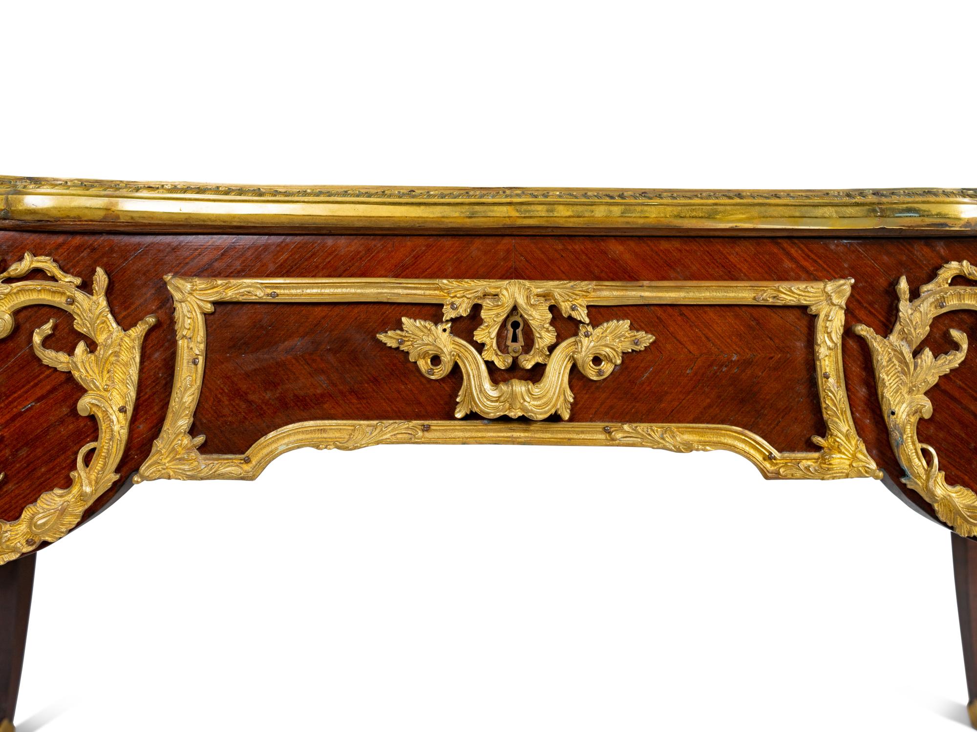 A Louis XV Style Gilt Bronze Mounted Kingwood Bureau Plat