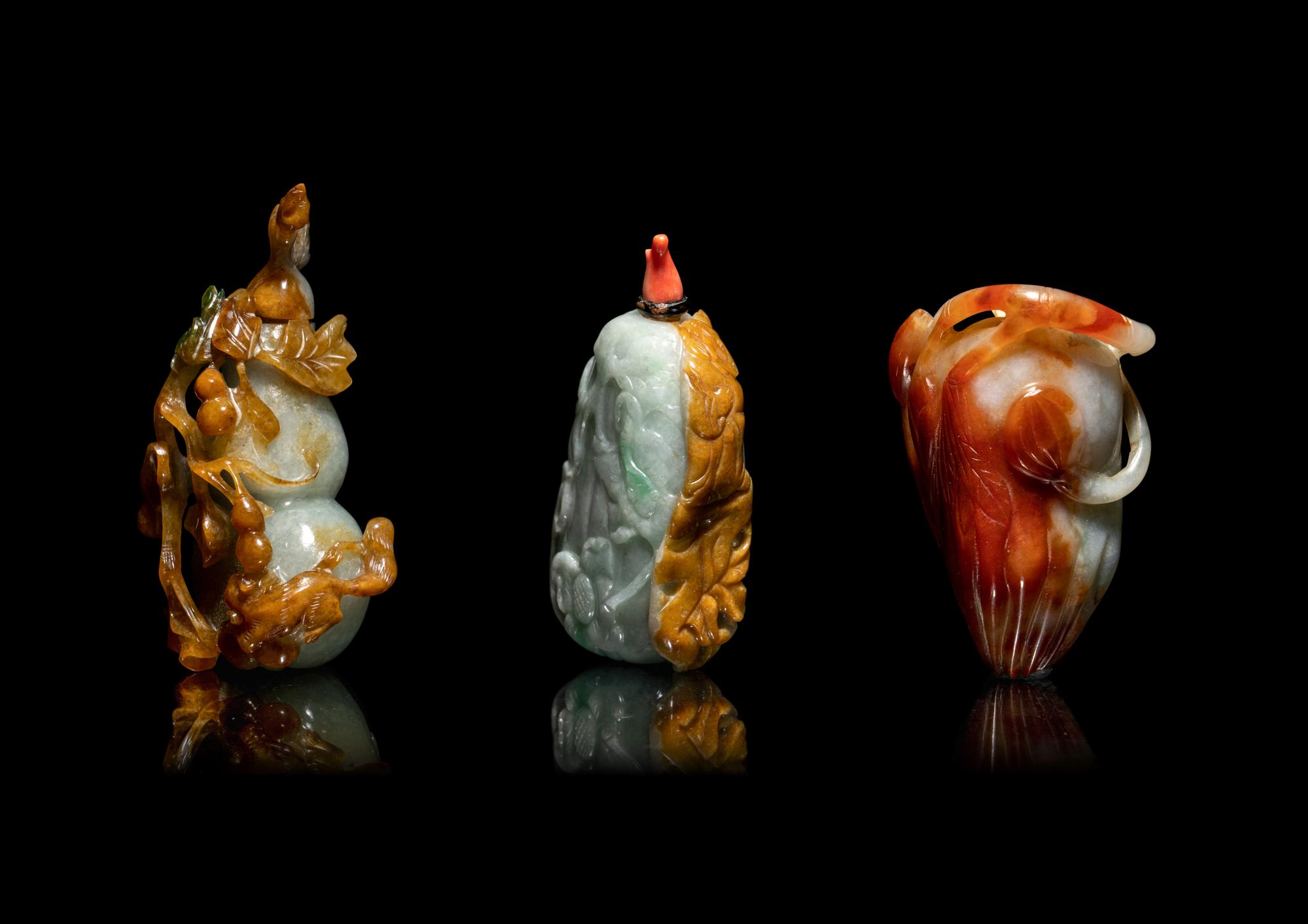 Three Chinese Russet and Green Jadeite Snuff Bottles