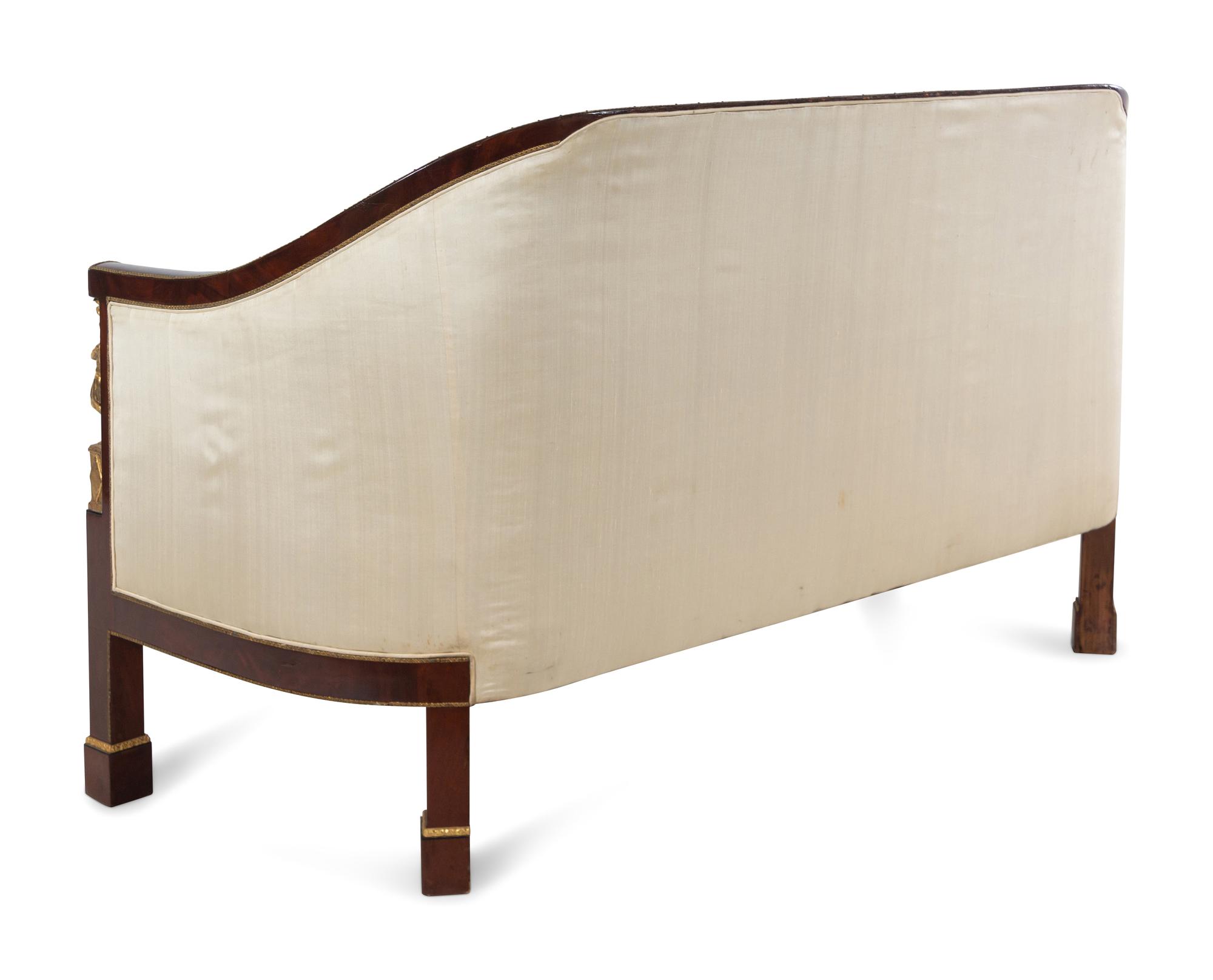 An Austrian Parcel Gilt Mahogany Sofa
