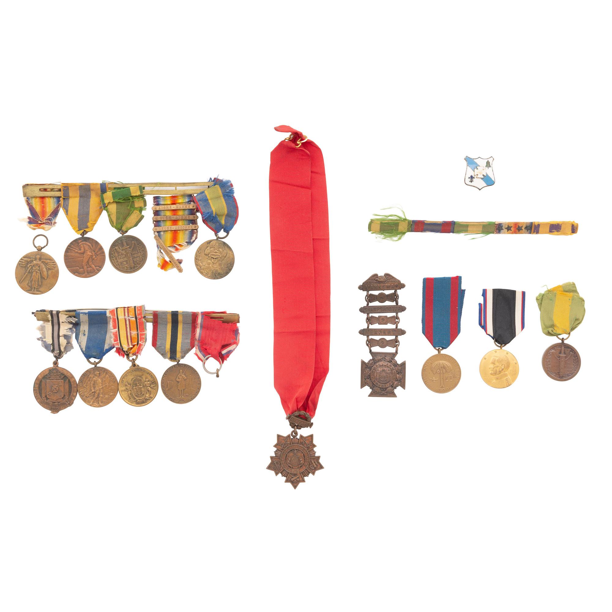 [Militaria] Large assortment of medals and related items from the Spanish American War, World Wars I and II.
