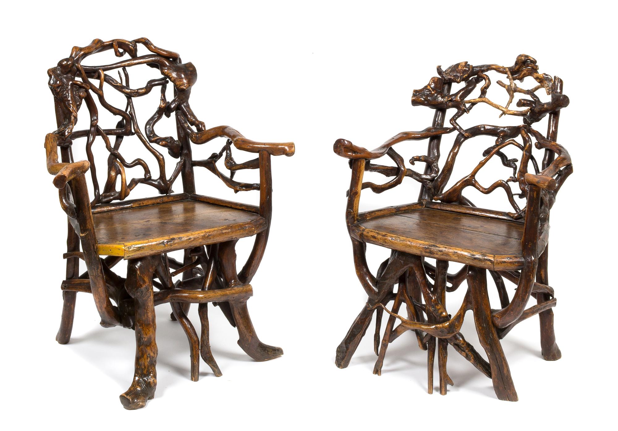 A Pair of Natural Branch and Limb Chairs Height 39 inches.