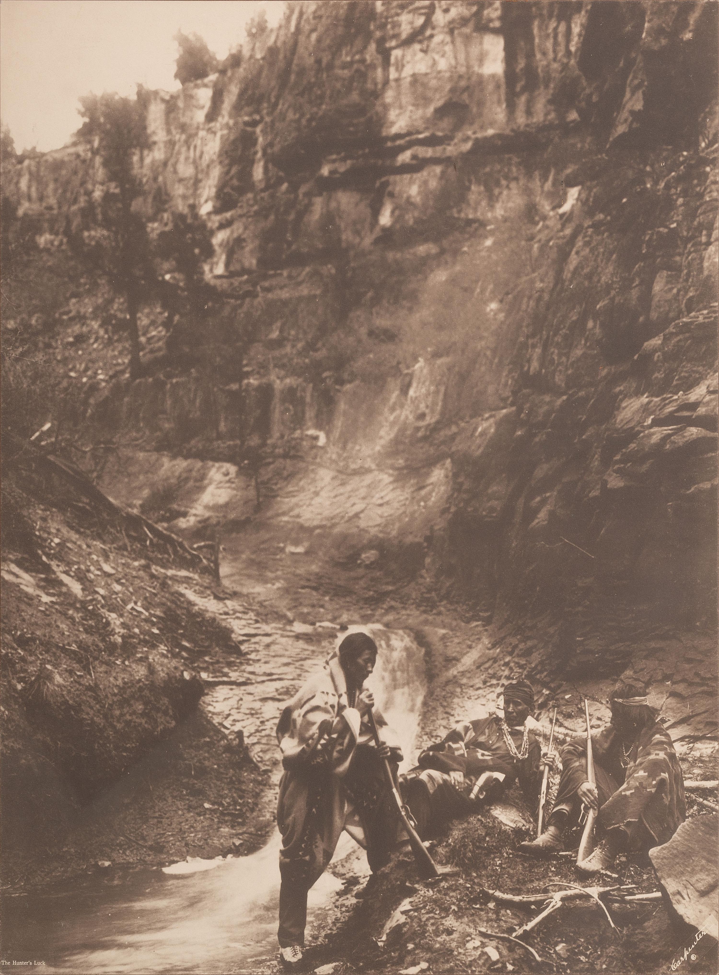 [NATIVE AMERICANS]. 2 photographs of Native American subjects by MOON and CARPENTER.