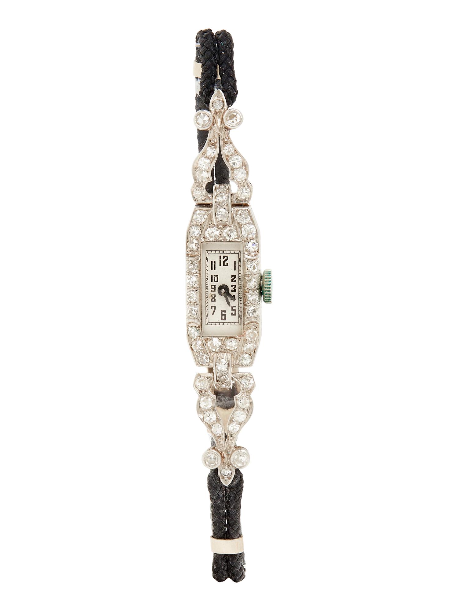 PLATINUM AND DIAMOND WATCH