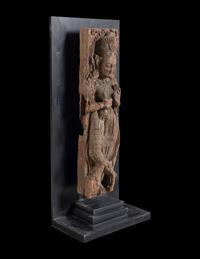An Indian Carved Wood Figure of a Deity
