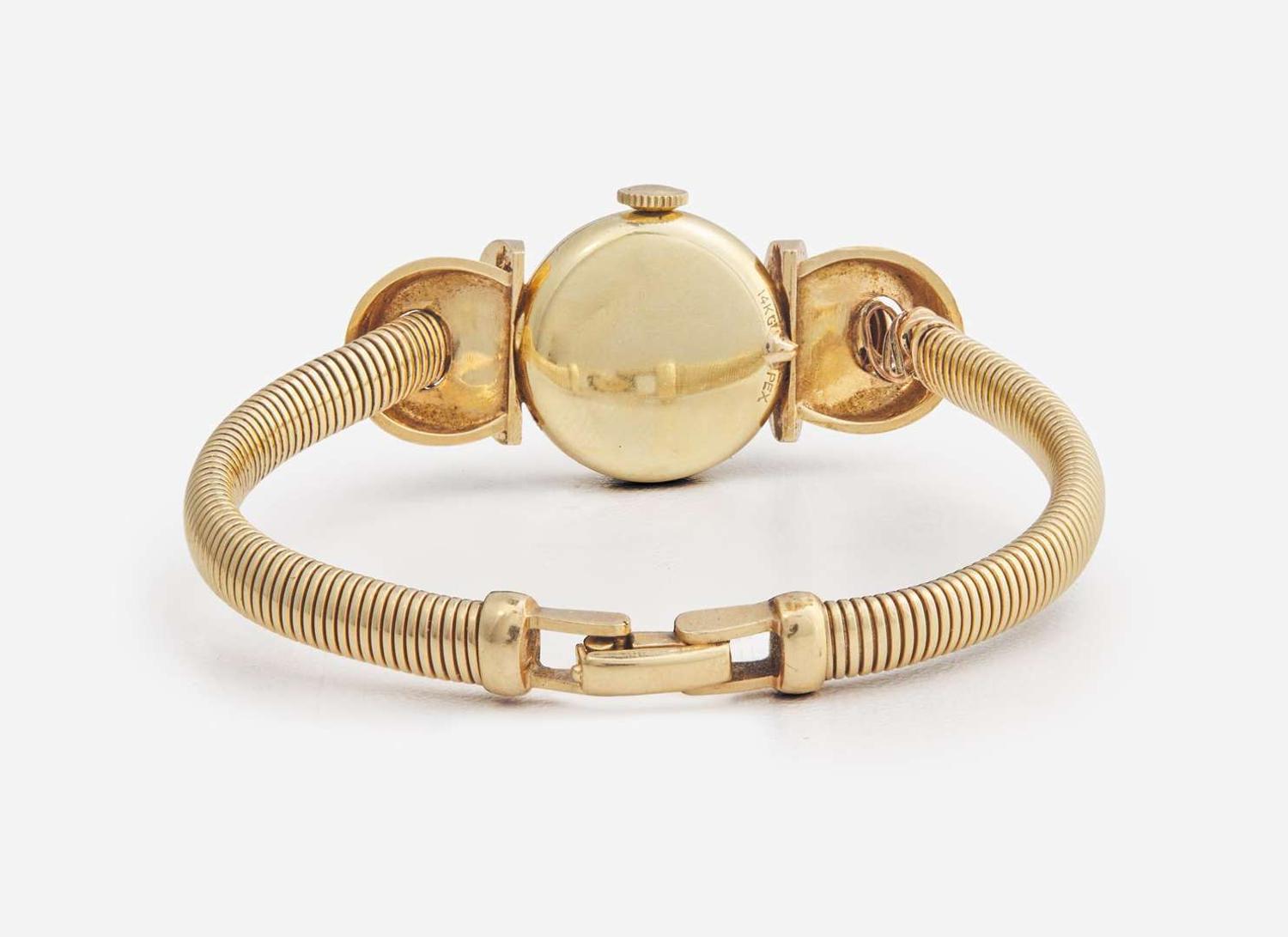 A Ladies 14K Yellow Gold LeCoultre Watch