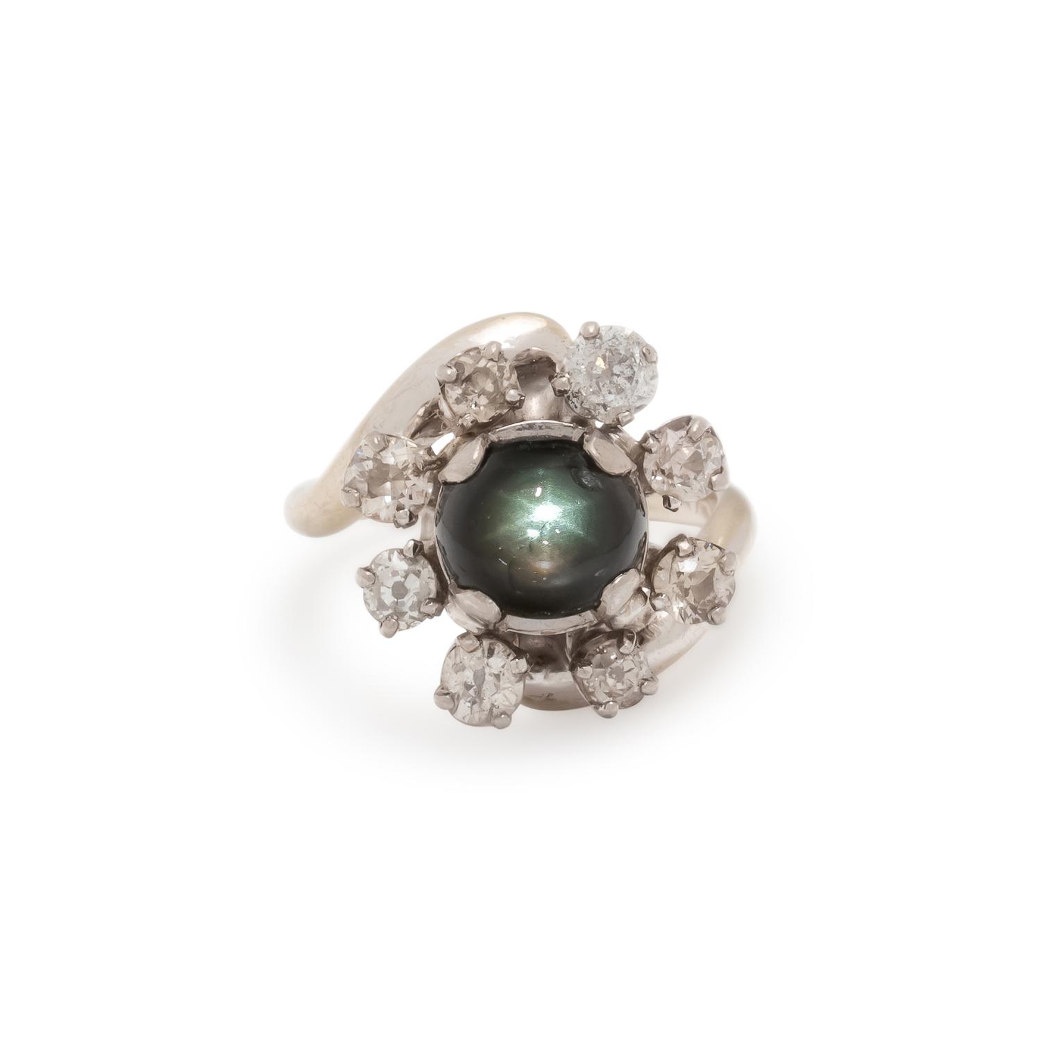 BLACK STAR SAPPHIRE AND DIAMOND RING