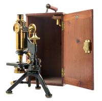 An English Brass and Black Lacquered Microscope Height 12 1/2 inches. — W. WATSON & SONS LTD., LONDON, EARLY 20TH CENTURY