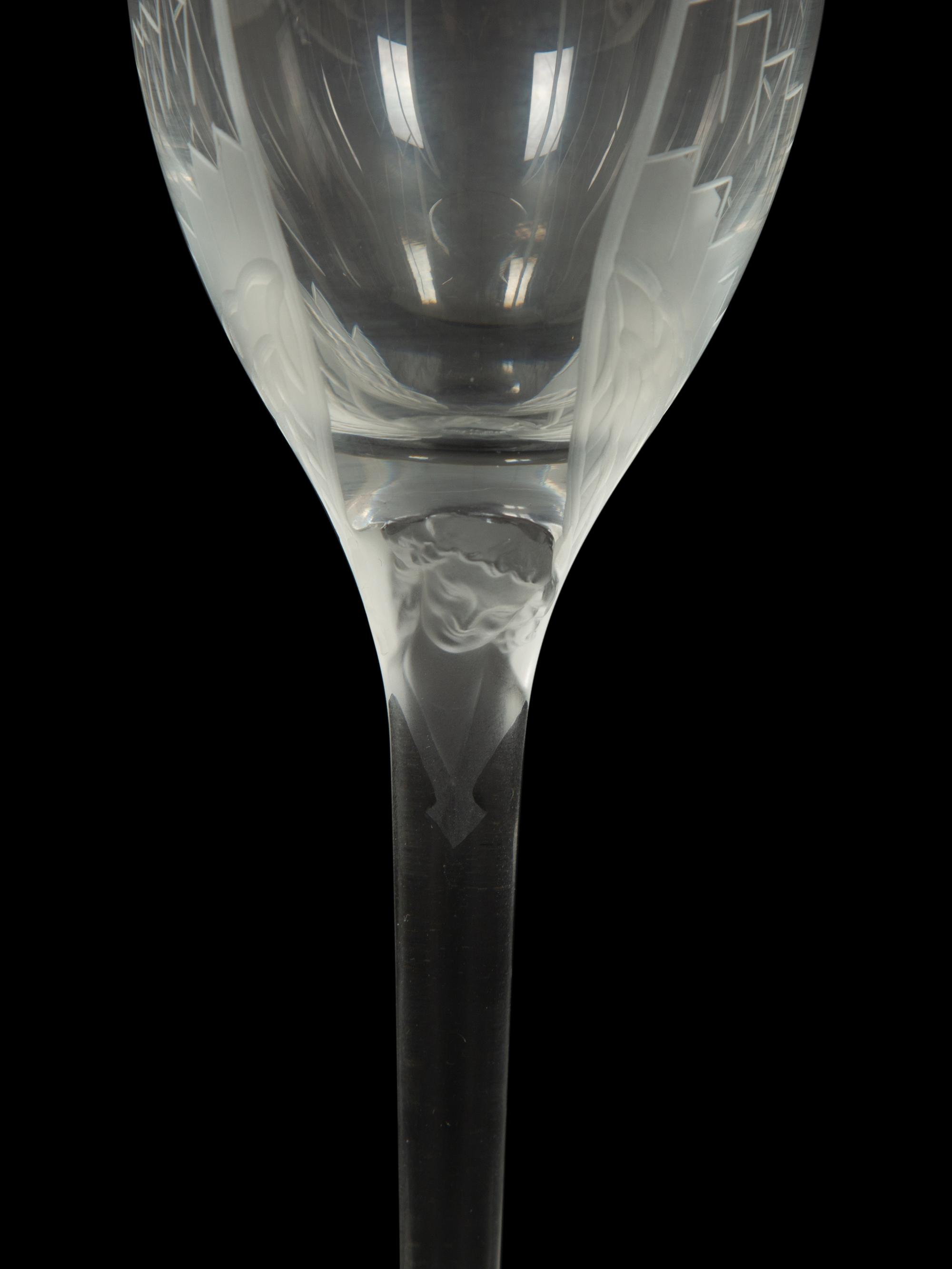 A Set of of Sixteen Lalique Ange Champagne F lutes