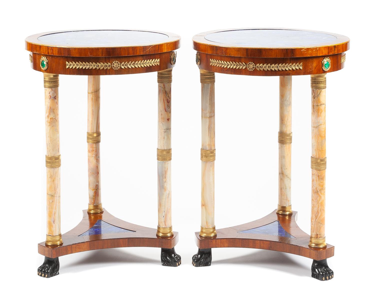 A Pair of Empire Style Gilt Bronze, Onyx and Lapis Lazuli Mounted Mahogany Gueridons Height 29 1/2 x diameter of top 20 1/2 inches.