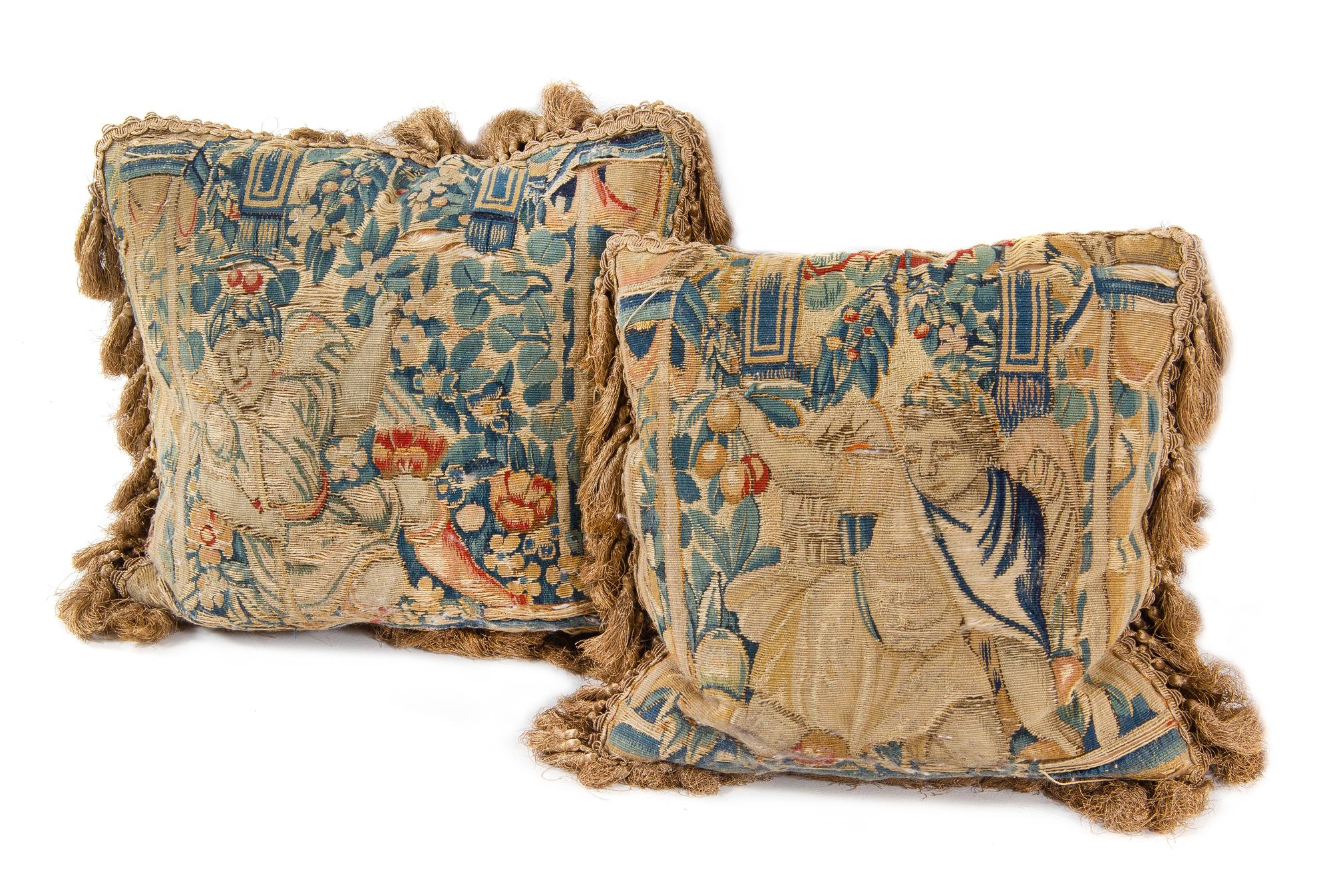 A Pair of Flemish Tapestry Pillows Height 14 x width 14 inches. — INCORPORATING 17TH CENTURY TAPESTRY