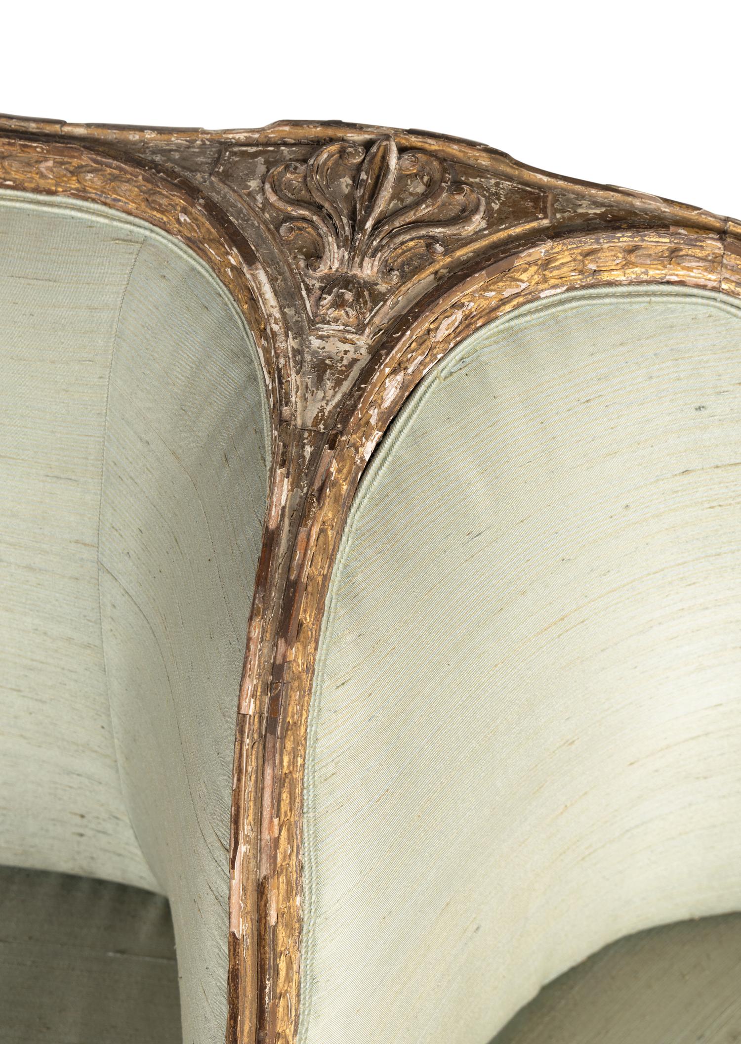 A George III Giltwood Confidante Sofa
