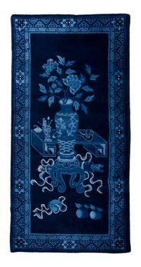 A Chinese Wool Rug, 3 feet 2 inches x 6 feet 2 inches.
