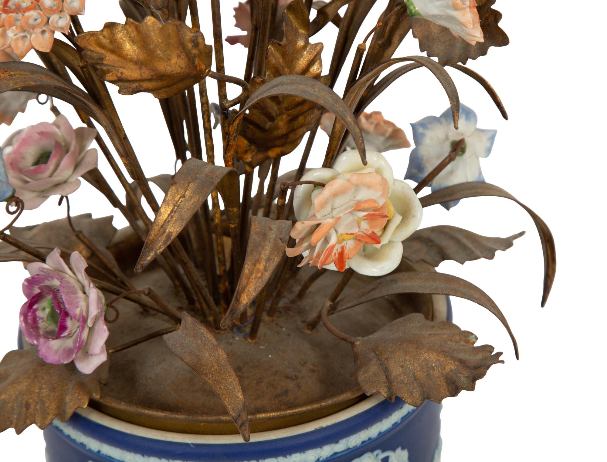 A Wedgwood Jasperware Cache Pot with a Tole and Porcelain Flower Arrangement