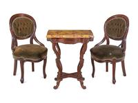 A Pair of Victorian Rococo Revival Walnut Side Chairs and a Victorian Side Table
