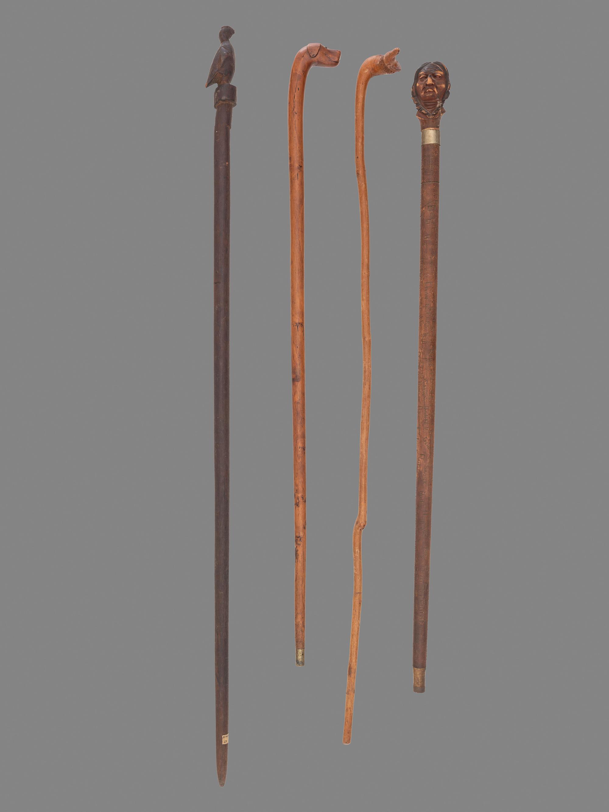 Four Folk Art Carved Canes