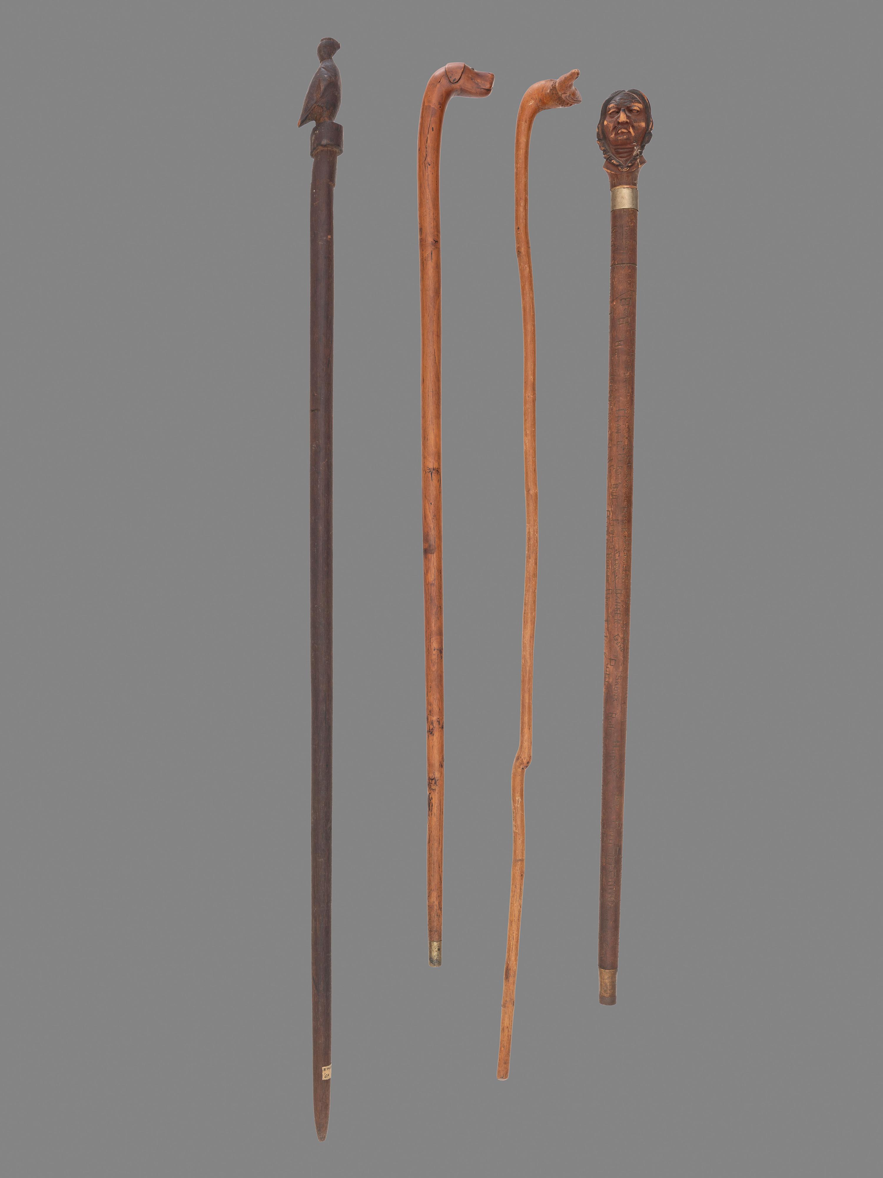 Four Folk Art Carved Canes