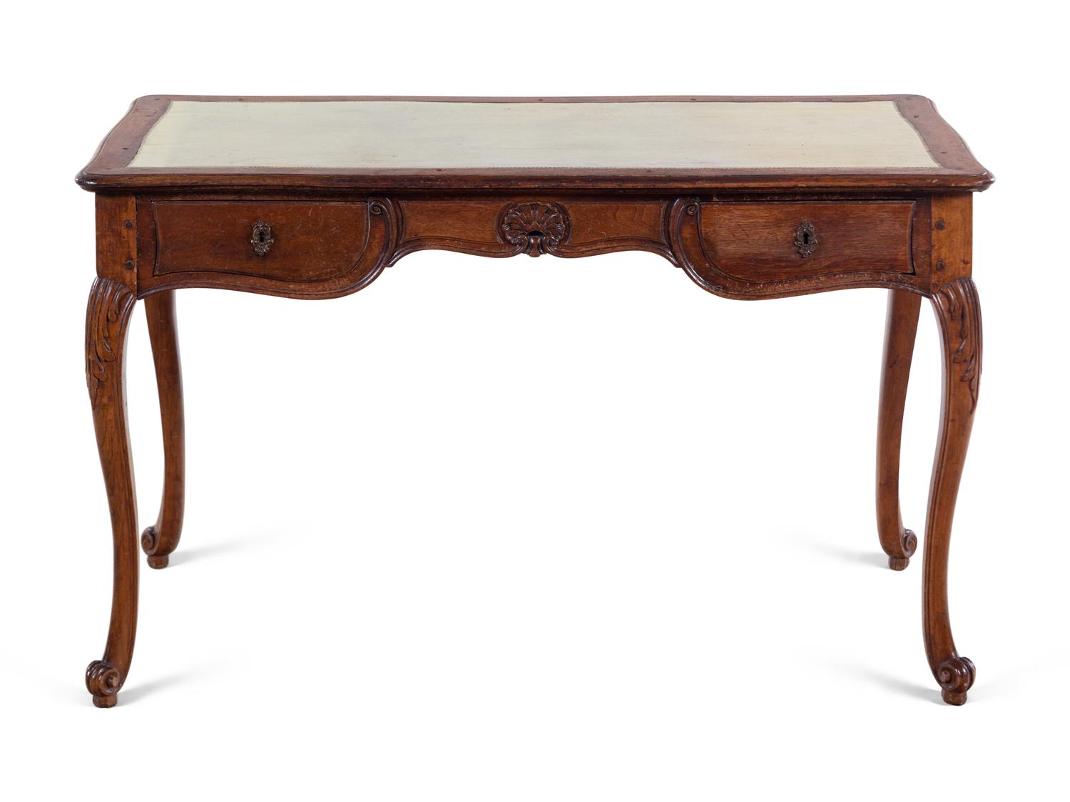 A Continental Leather-Inset Walnut Writing Table