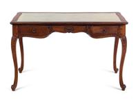 A Continental Leather-Inset Walnut Writing Table