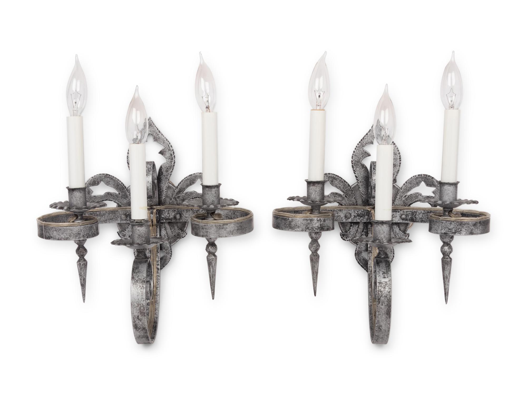A Pair of Silvered Wrought Iron Three-Light Sconces