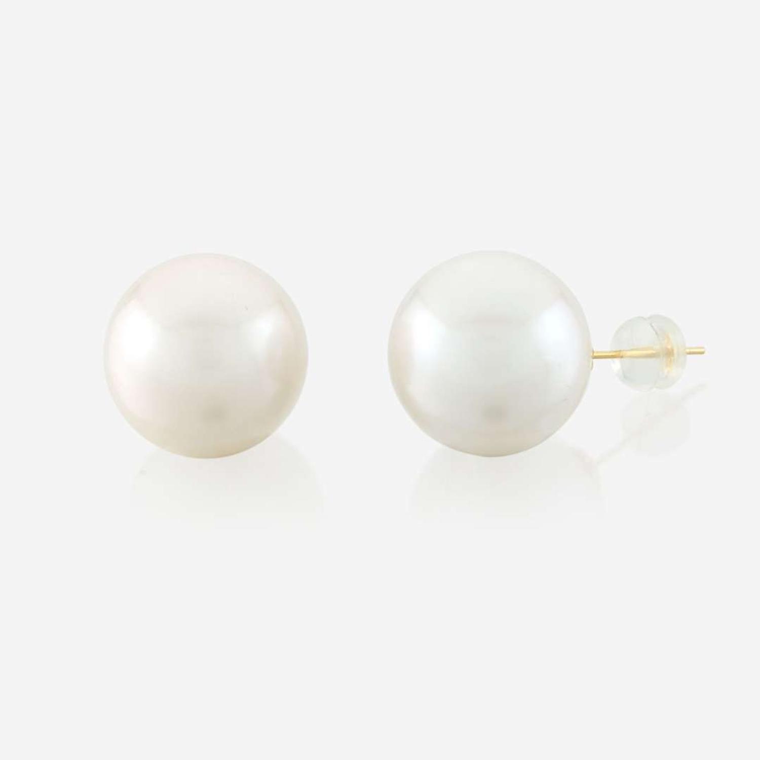 A South Sea cultured pearl and gold necklace with matching earrings