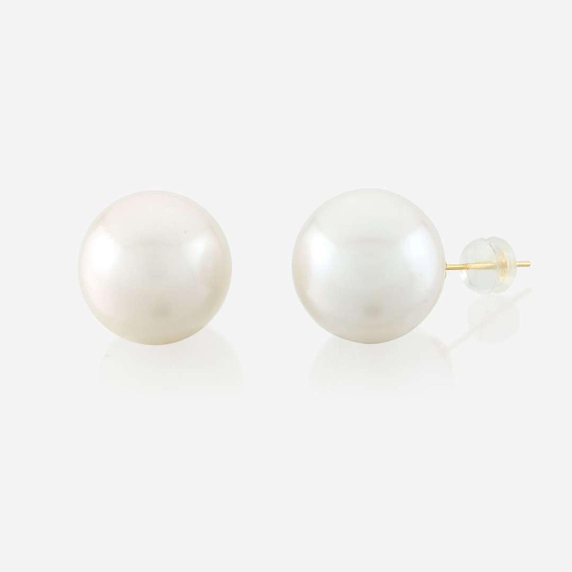 A South Sea cultured pearl and gold necklace with matching earrings