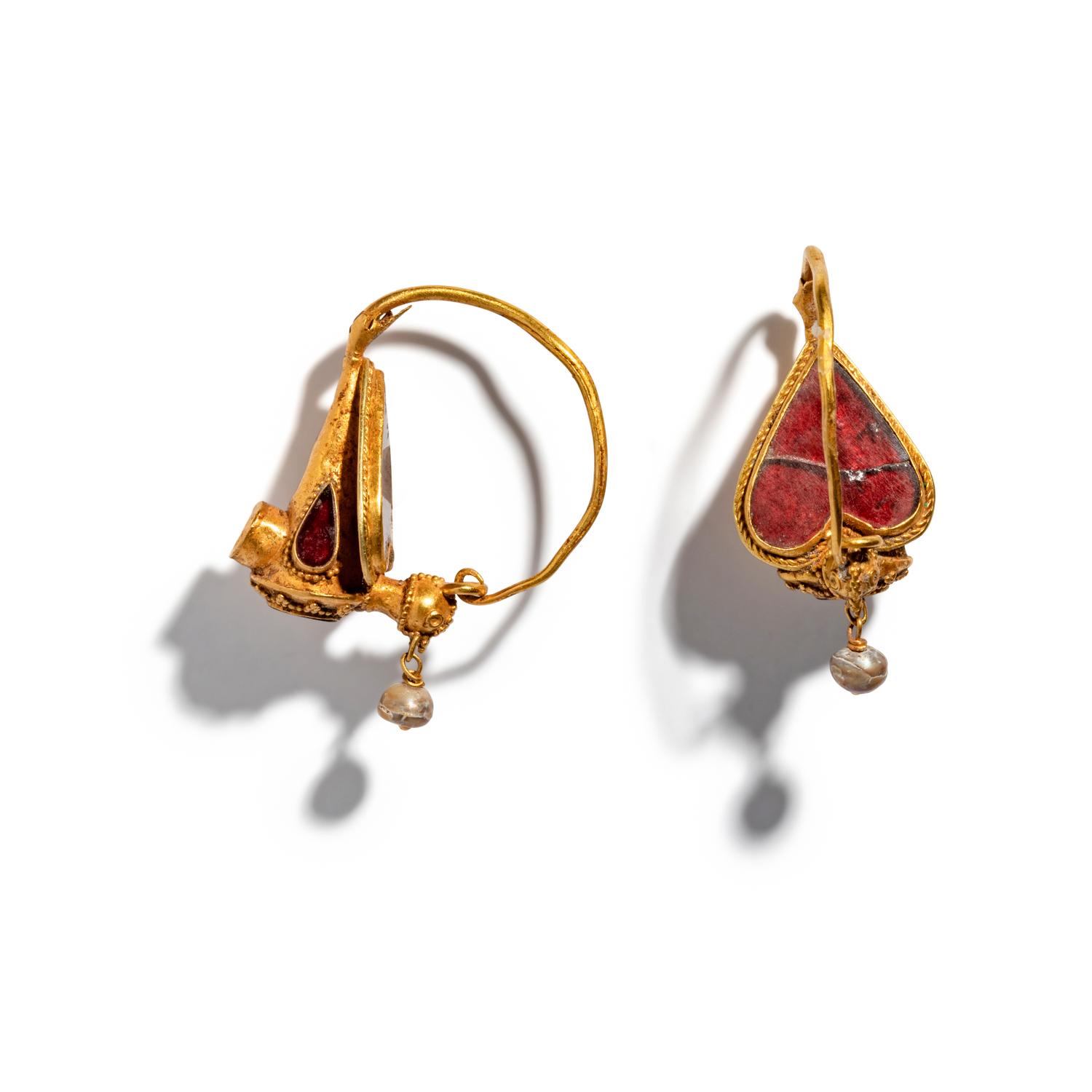A Pair of Byzantine or Islamic Gold and Garnet Bird-Shaped Earrings