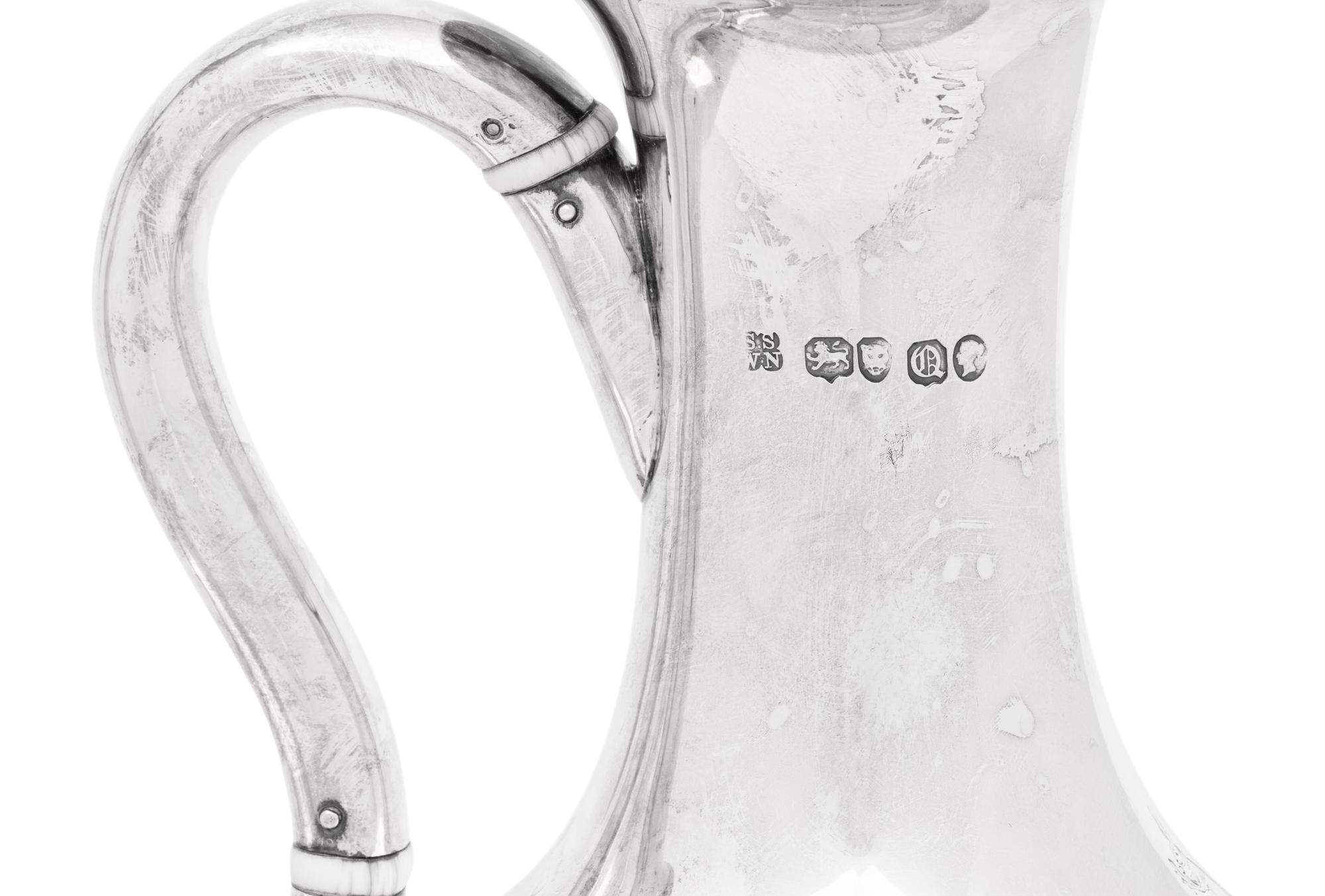 A Pair of Victorian Silver Pitchers