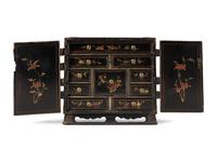 A Chinese Export Lacquered Cabinet
