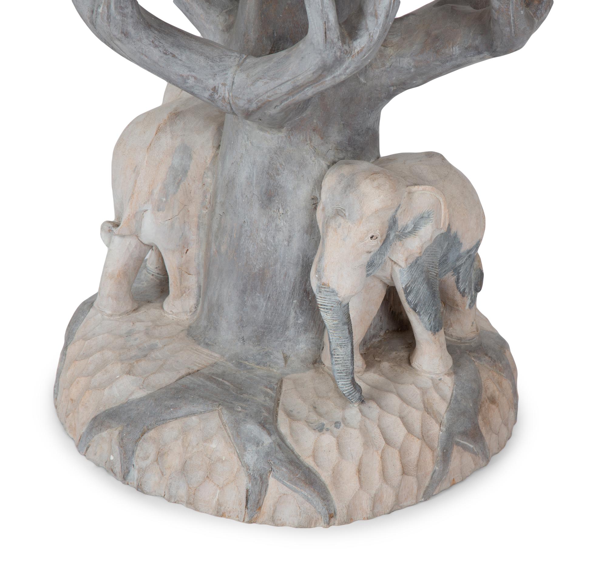 A Carved and Polychromed Wood Elephant Table with Glass Top — 20TH CENTURY