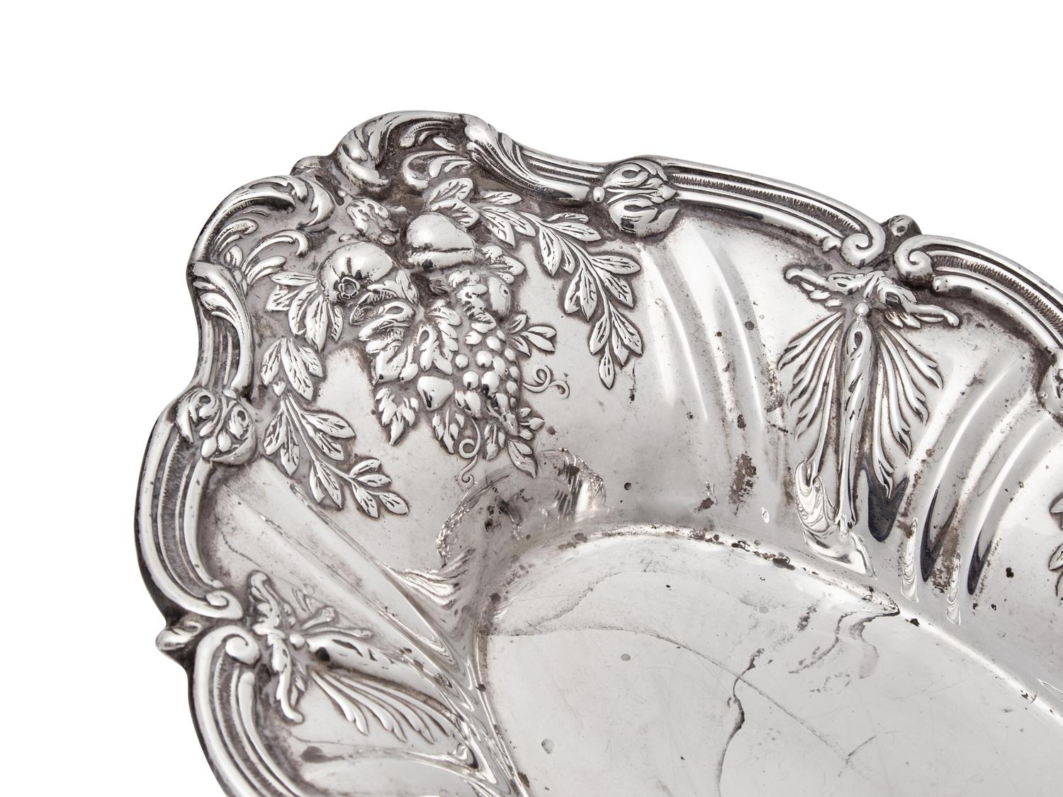 A Group of American Silver Floral Repoussé Table Articles