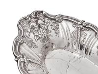 A Group of American Silver Floral Repoussé Table Articles