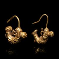 A Matched Pair of Chinese Gold 'Capricorn' Earrings, Erhuan, Liao Dynasty 遼 摩羯形金耳環兩隻