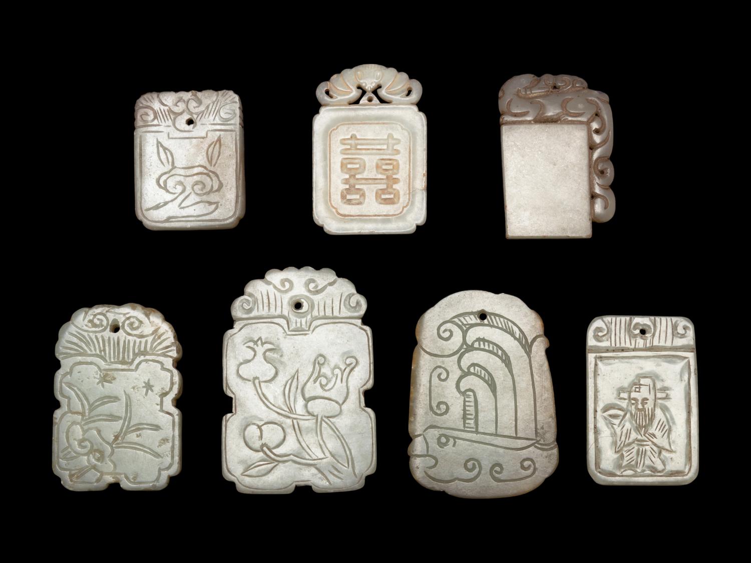 Seven Chinese Pale Celadon Jade Carved Plaques