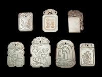 Seven Chinese Pale Celadon Jade Carved Plaques