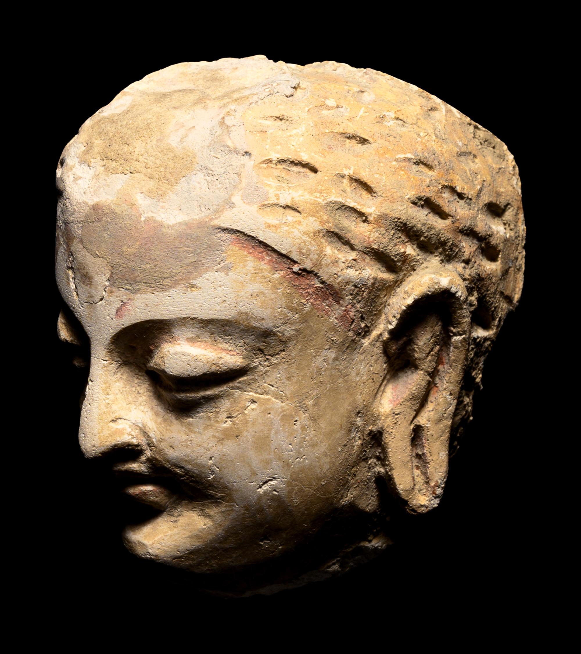 Three Gandharan Fragmentary Stucco Heads