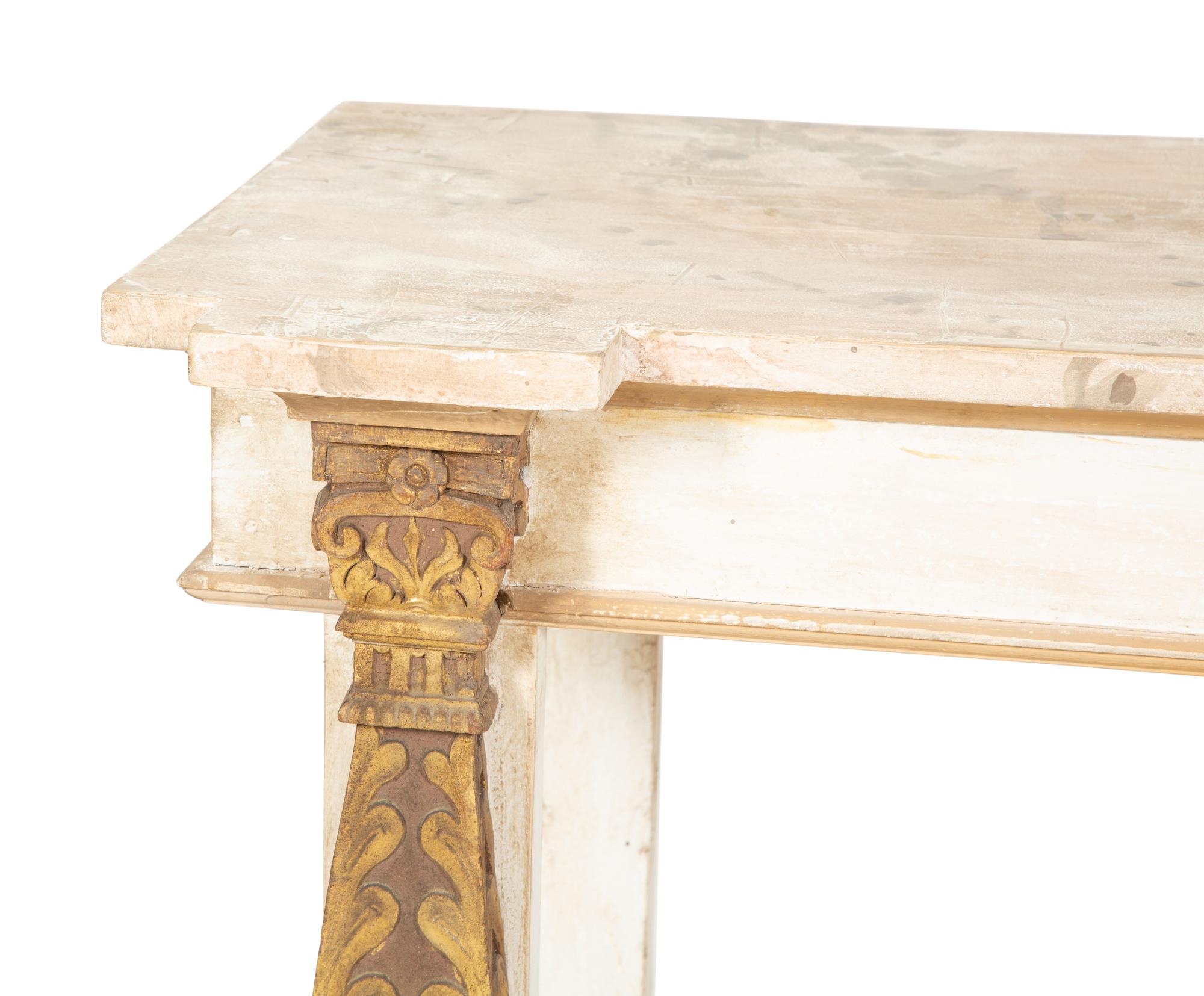 A Pair of French Neoclassical Painted and Parcel Gilt Pier Tables