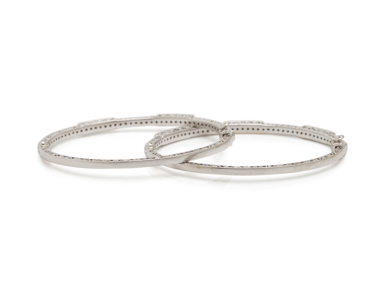 CHARIOL, PAIR OF WHITE GOLD AND DIAMOND BANGLE BRACELETS