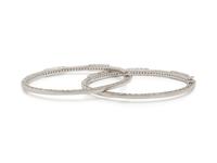 CHARIOL, PAIR OF WHITE GOLD AND DIAMOND BANGLE BRACELETS